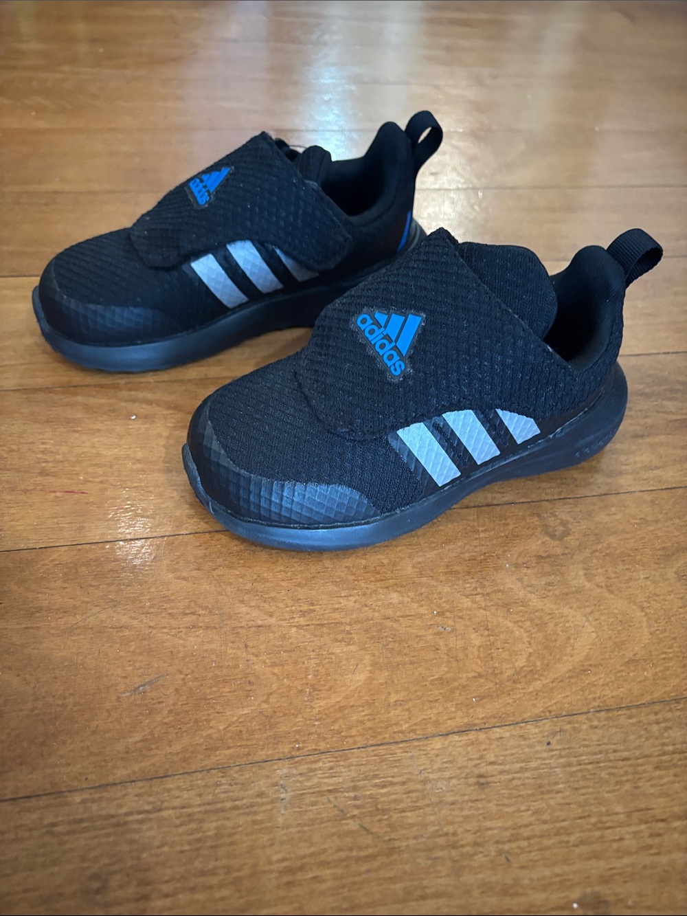 Adidas Fortarun Kids Black Sneakers with Blue Logo and Silver Stripes